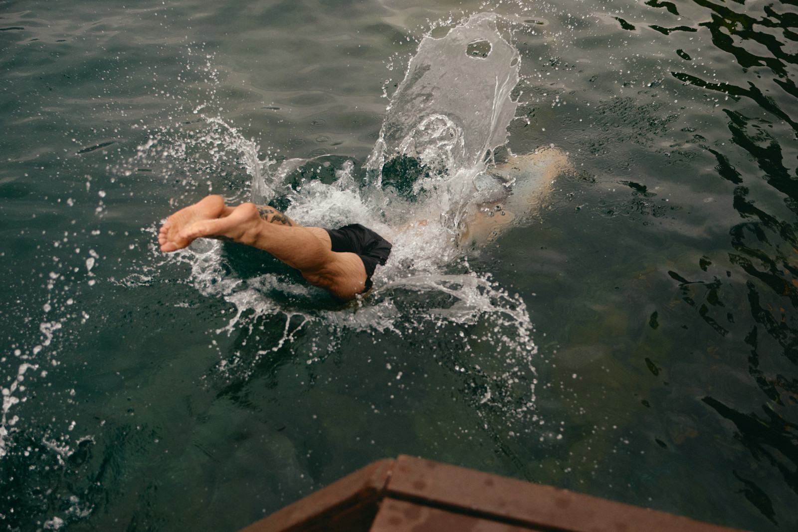 Person swimming outdoors